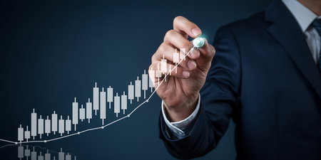 Businessman drawing graphics a growing graph on virtual screen. Business growth conceptの素材