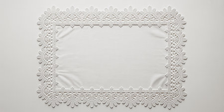 White lace on a white background. Place for text. Top view.の素材
