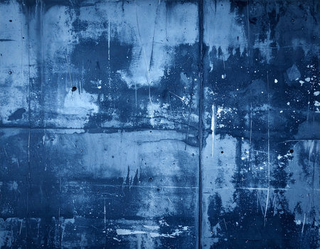 Blue grunge background with some damage on it and some stains on itの素材