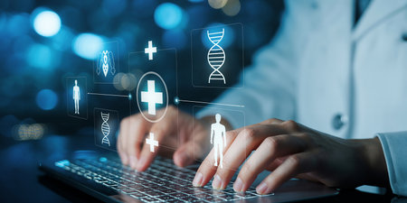 Female doctor using laptop computer with medical icons and symbols on blurry backgroundの素材