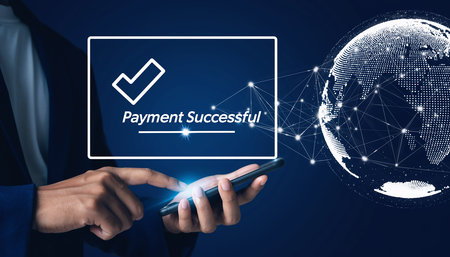 Businessman using smartphone with business process concept on dark blue background.の素材