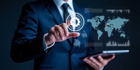 A businessman touches a gear icon on a holographic world map interface. Clear details and vibrant colors enha...の素材