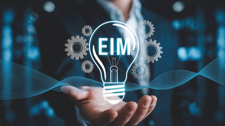 Environment showing person holding illuminated lightbulb with eim text and gears in a digital environment...の素材