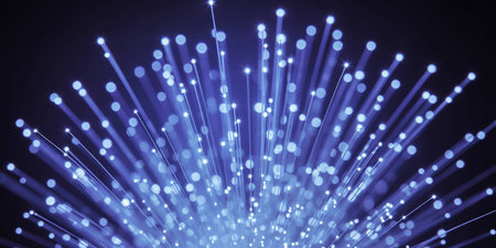 3d rendering of blue fiber optic light strands flowing in the darkの素材