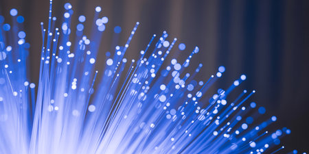 bunch of optical fibres dinamic flying from deep on technology backgroundの素材