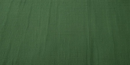 Green fabric texture background. High resolution photo. Full depth of field.の素材