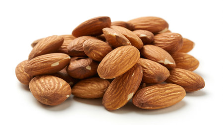 Heap of Almond nuts isolated on white background close up.の素材