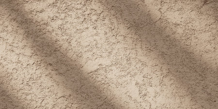 Texture of old rustic wall covered with beige stuccoの素材