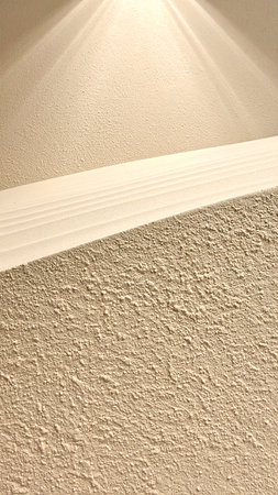 light beam on white wall, closeup of photo with soft focusの素材