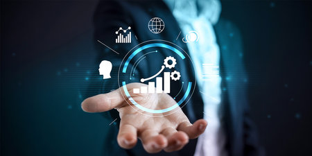 Businessman on blurred background using digital chart interface with his hand 3D renderingの素材