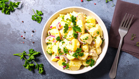 Potato salad with onion and parsley. Selective focus.の素材