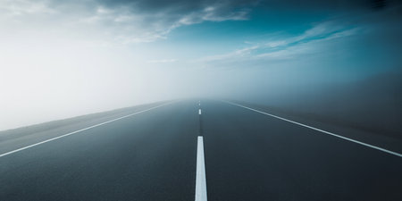 Asphalt road through the fog in the early morning. 3d renderingの素材