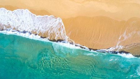 Aerial view of beautiful beach with turquoise water and sandの素材