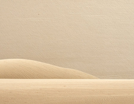 Wooden table with sand dunes on the background of the wallの素材
