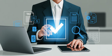 Businessman working with laptop and tablet computer and check mark icon on screenの素材