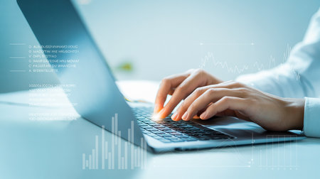 Close up of businesswoman hands typing on laptop keyboard. Mixed mediaの素材