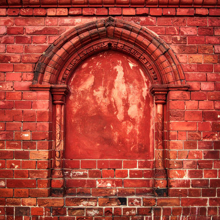 Red brick wall with arched window. Architectural background. Toned.の素材