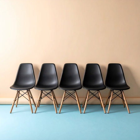 Row of black chairs in a row on a blue background. 3d renderの素材