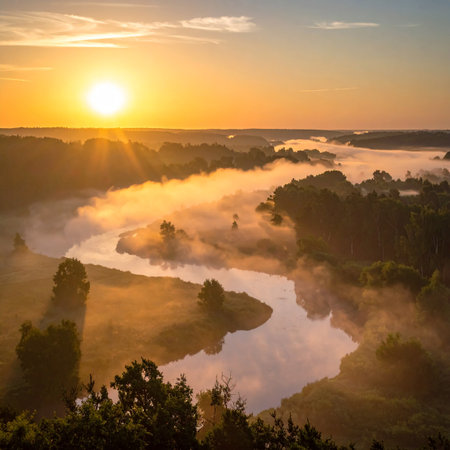 Aerial view of beautiful misty sunrise over river in summer morningの素材