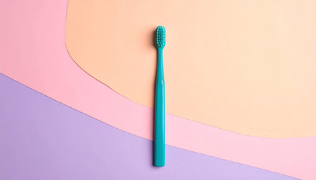 toothbrush on a colored background, top view, copy spaceの素材