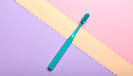 Blue toothbrush on pastel background, top view. Oral care conceptの素材