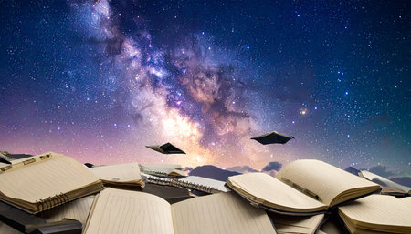 Open book and milky way at night. Mixed media. Mixed mediaの素材