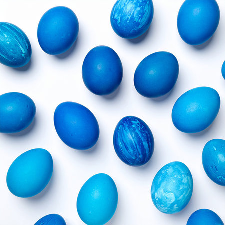 Blue easter eggs isolated on white background. Flat lay, top viewの素材