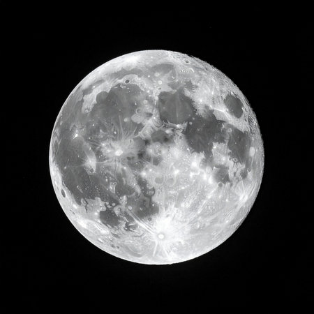 Full moon in black and white. Isolated on black background.の素材