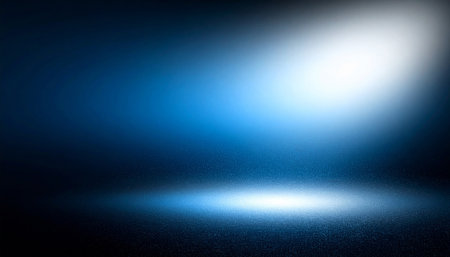 abstract blue background with spotlight and copy space for text or imageの素材