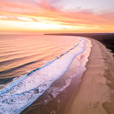 Aerial view of beautiful beach at sunset time. Drone photography.の素材