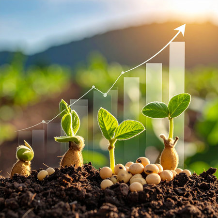 Seedlings of soybeans growing in soil with growth graph.の素材