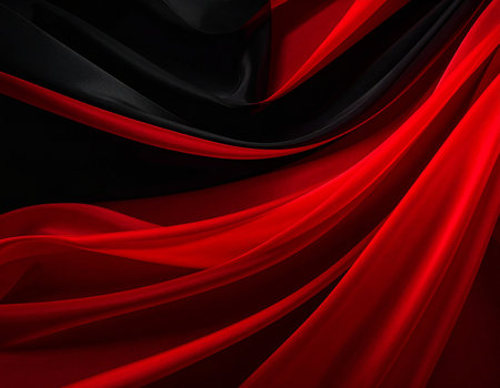 Abstract flowing waves of red and black fabric create a dramatic and luxurious textured background.の素材