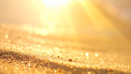Golden sand dunes under bright sunlight with sparkling grains and bokeh Clear details and vibrant colors enha...の素材