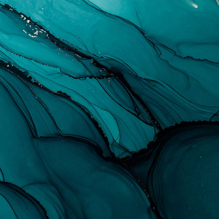 Abstract teal and black ink flows with delicate metallic silver accents creating a dynamic pattern.の素材