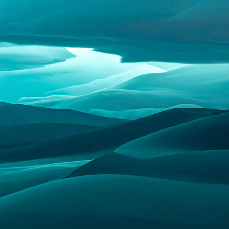Ethereal teal desert dunes roll under a dramatic sky filled with wispy clouds. Clear details and vibrant colo...の素材