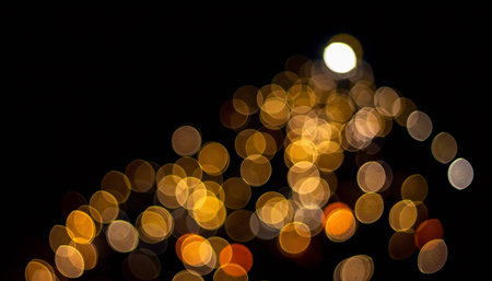 Abstract circular bokeh background of Christmaslight in city at nightの素材