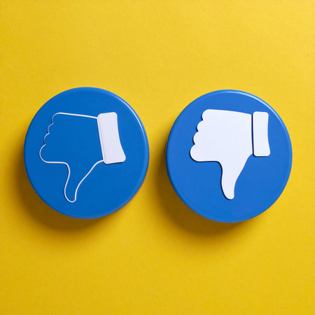 Like and dislike sign on a yellow background. Social media concept.の素材