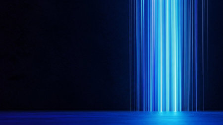 Vertical beams of bright blue light shine down onto a dark, reflective surface, creating a dramatic and futuristic industrial scene.の素材