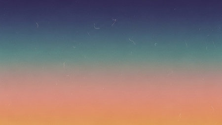 A soft gradient transitioning from deep blue to orange, overlaid with subtle film grain and scratches for a vintage feel.の素材