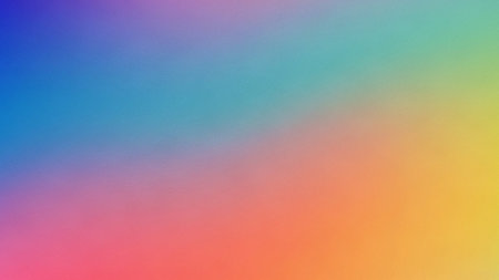 A vibrant rainbow gradient smoothly transitions through a spectrum of colors from blue and teal to pink and yellow with a subtle grain texture.の素材