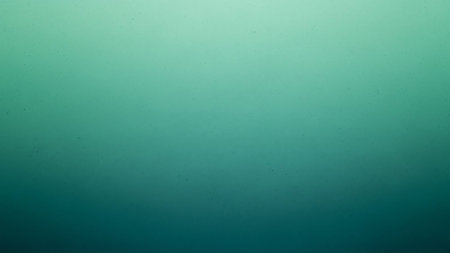 A gradient from deep teal to light green with a subtle speckled texture. Clear details and vibrant colors enhance visual appeal.の素材