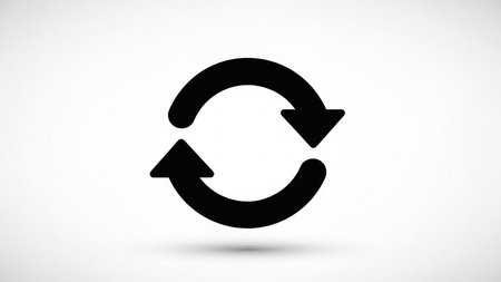 A black icon of two circular arrows forming a loop, indicating a refresh or repeat action.の素材