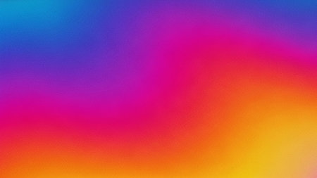 A vibrant gradient background transitioning smoothly from deep blue through pink and orange to bright yellow with a subtle grain texture.の素材