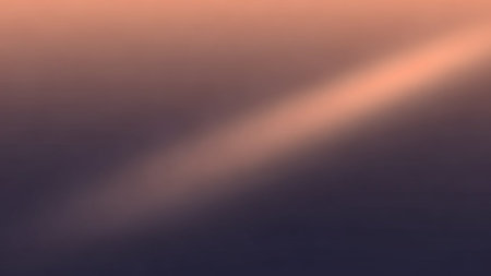 A dramatic diagonal light beam cuts across a dark, subtly textured gradient background, creating a moody and atmospheric effect.の素材