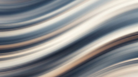 Abstract blurred background with flowing waves of blue, white, and tan colors, creating a sense of smooth motion and depth.の素材