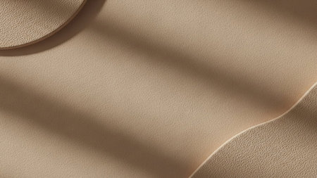 Abstract beige background with textured geometric shapes and soft shadow overlay. Clear details and vibrant co...の素材