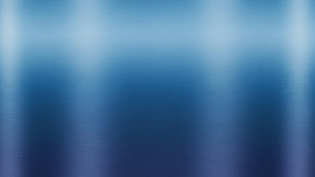 A close-up of a blue brushed metal surface with vertical light reflections and subtle texture.の素材