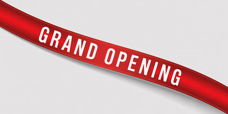 A diagonal red ribbon with the words GRAND OPENING in white text on a white background.の素材
