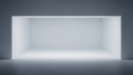 A minimalist empty white room with soft, bright light emanating from a large opening, creating a sense of depth.の素材
