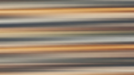Abstract background composed of blurred horizontal stripes in warm, earthy tones of brown, orange, and grey.の素材